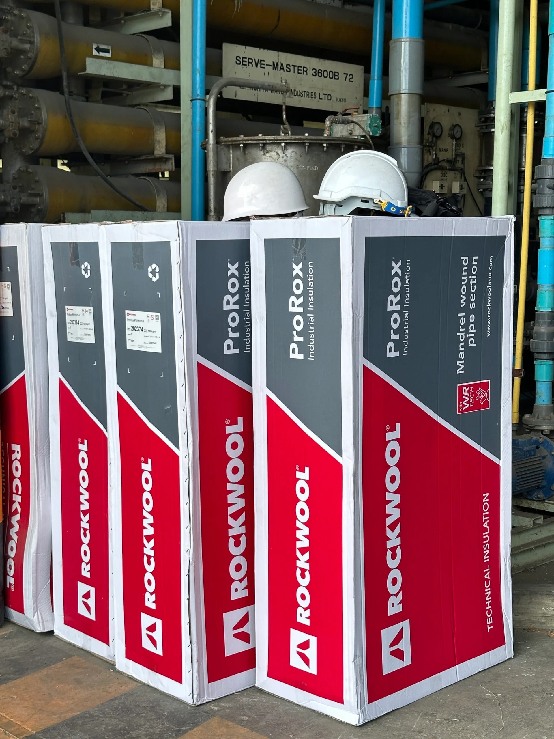 Boxes of Rockwool ProRox industrial pipe insulation at a job site